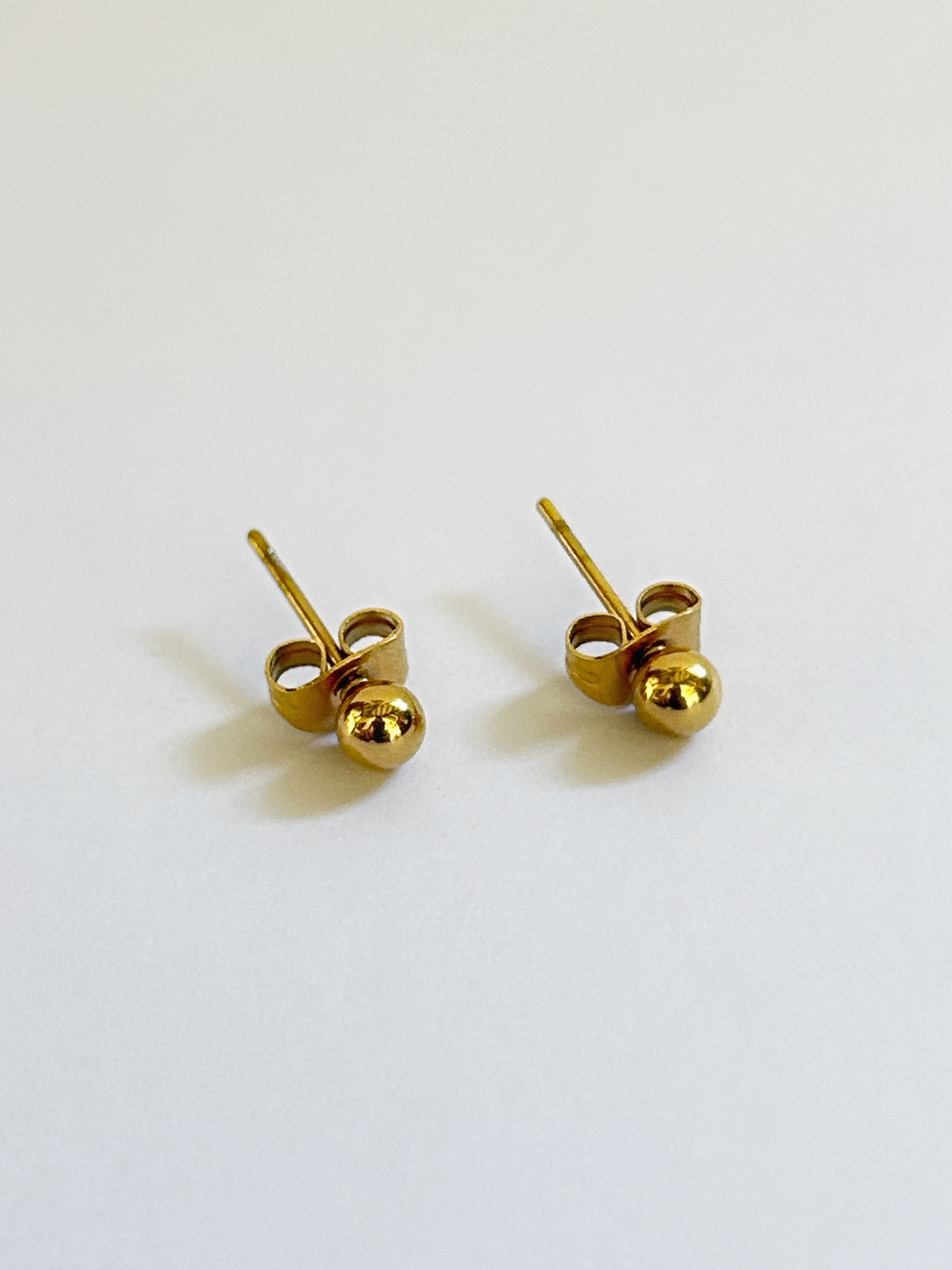 Aretes Topo Dorado Mujer