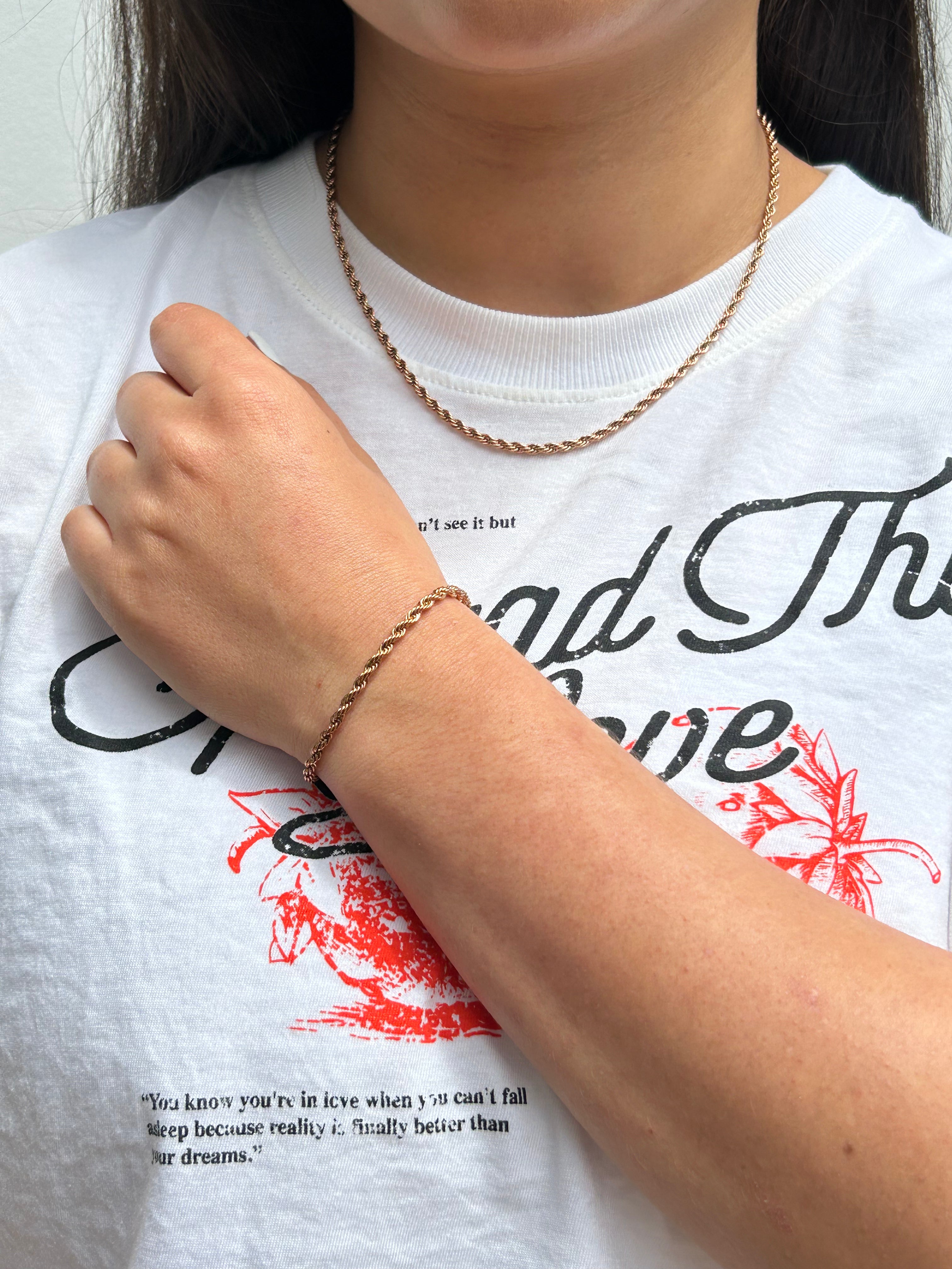 Combo Cadena Lazo Rosa + Pulsera Lazo Rosa Mujer